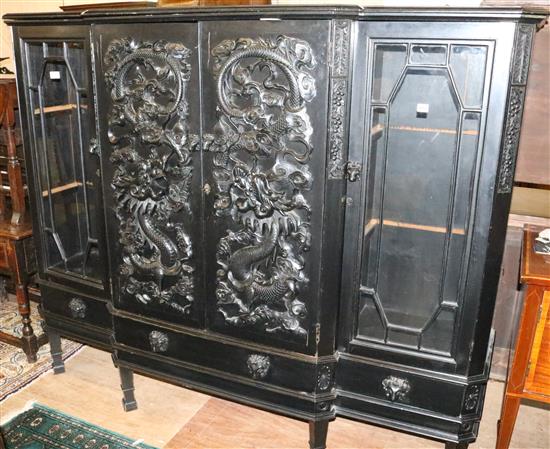 Chinese ebonised carved display cabinet(-)